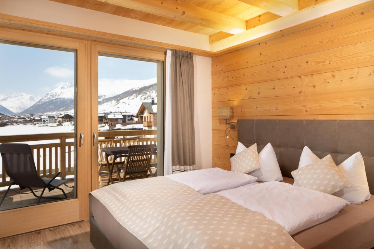 B&B Ecohotel Chalet Des Alpes Livigno Exterior photo