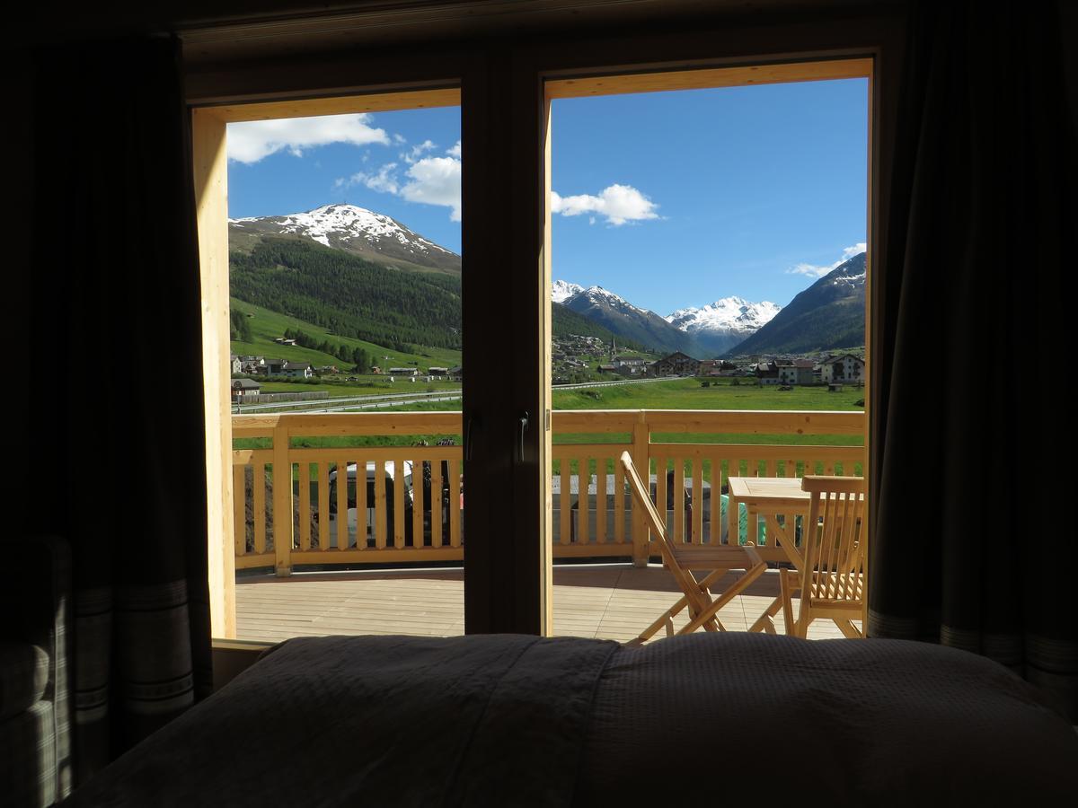 B&B Ecohotel Chalet Des Alpes Livigno Exterior photo