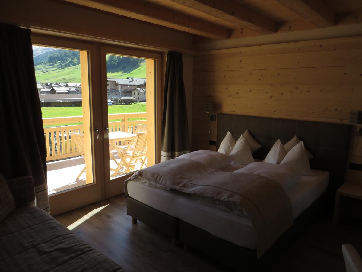 B&B Ecohotel Chalet Des Alpes Livigno Exterior photo